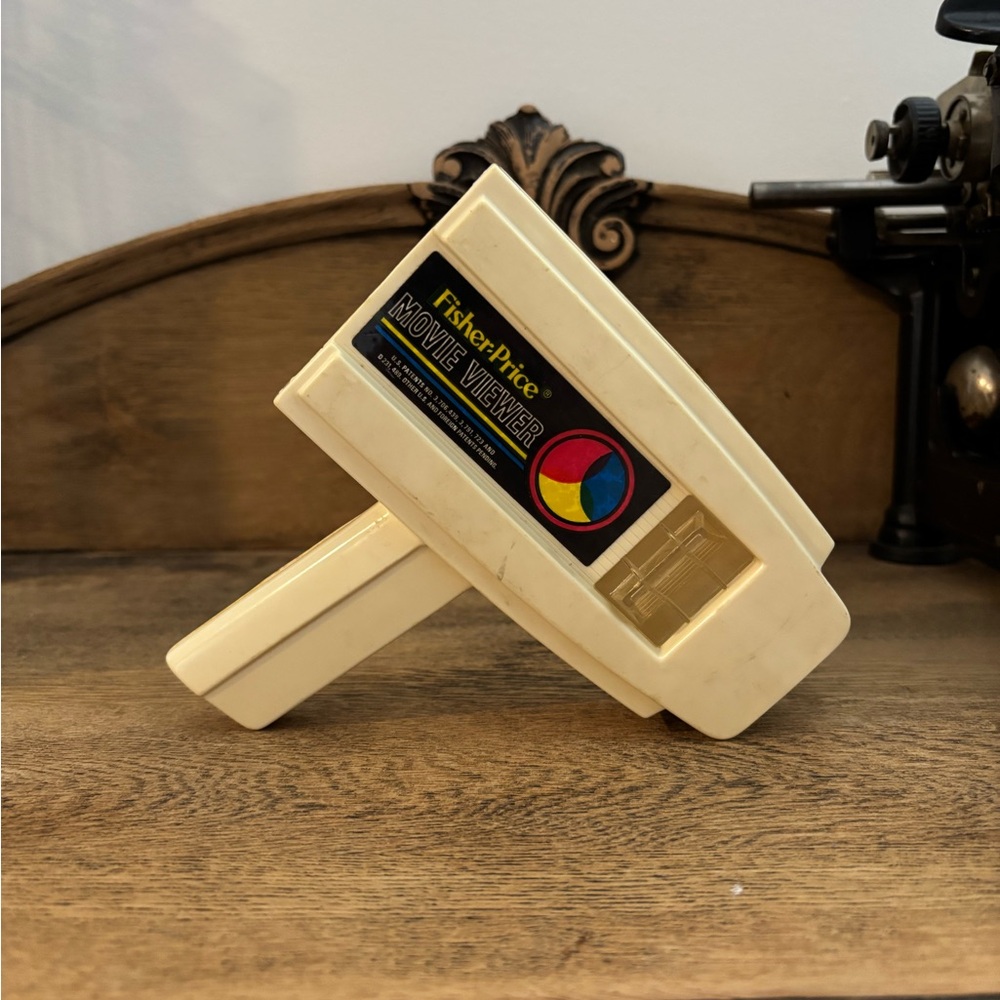 Fisher-Price Cream Movie Viewer with Colorful Logo